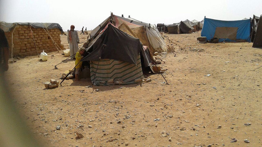 Displaced Syrians are seen at Rakban makeshift encampment in the no-man’s-land between Jordan and Syria on Thursday (Photo courtesy of Ali Abdullah)