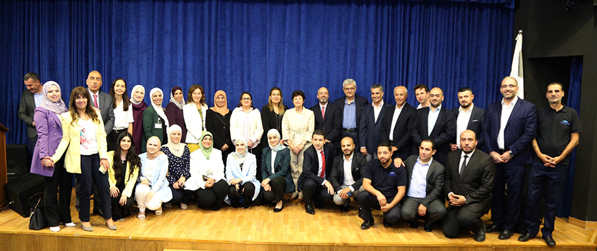 Guests and officials pose for a photo during a ceremony marking the National Council for Family Affairs’ 20th anniversary on Monday (Photo courtesy of NCFA)
