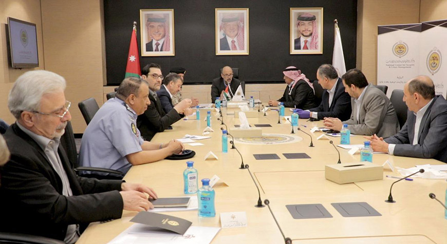 Prime Minister Omar Razzaz chairs a coronavirus crisis cell meeting at the National Centre for Security and Crisis Management on Saturday (Petra photo)