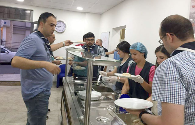 In this recent photo, volunteers at the Restaurant of Mercy in Amman's Jabal Luweibdeh prepare the iftar meal to serve underprivileged people during Ramadan (Photo courtesy of Restaurant of Mercy and Caritas Jordan)