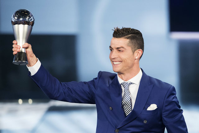 Cristiano Ronaldo of Portugal poses with the trophy after winning the Best FIFA Men's Player award in Zurich, Switzerland, Monday (AP photo) 