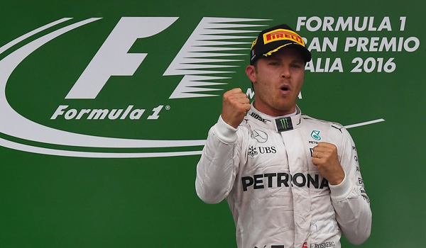Winner Mercedes AMG Petronas F1 team’s German driver Nico Rosberg celebrates on the podium following the Italian Formula One Grand Prix at the Autodromo Nazionale circuit in Monza, on Sunday (AFP photo Gabriel Bouys)