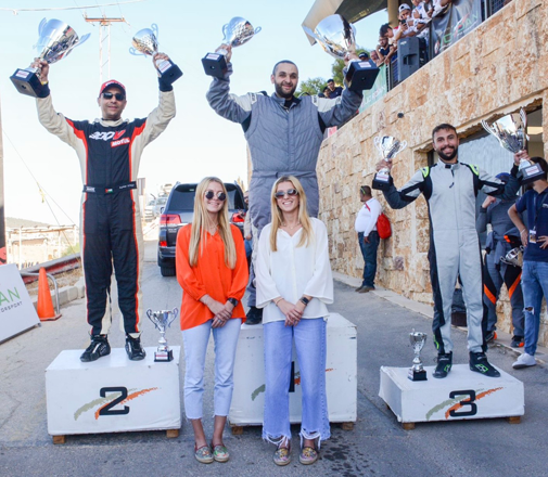 Their Royal Highnesses Princess Sara Bint Feisal and Princess Aisha Bint Feisal with winners of the 49th Al Hussein Rumman Hill Climb on Friday (Photo courtesy of Jordan Motor Sport)