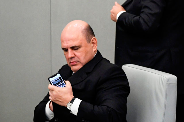 Mikhail Mishustin, President Vladimir Putin’s nominee for the post of prime minister, attends a session of the State Duma lower parliament in Moscow on Thursday (AFP photo)