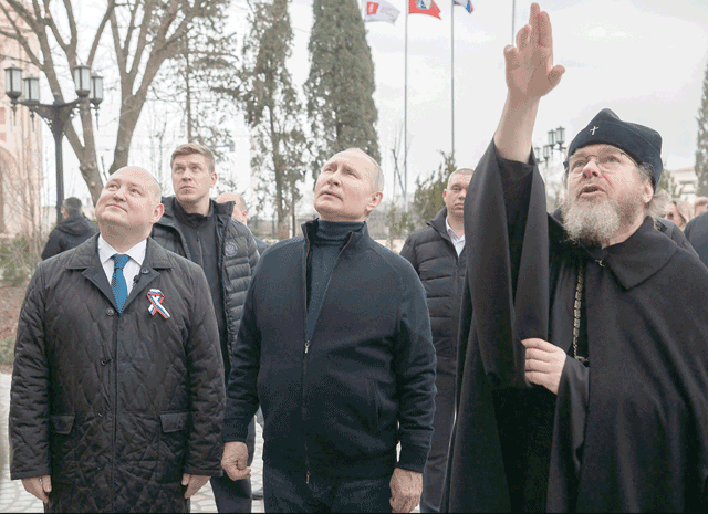 This handout photograph taken and released by the Russian presidential press office in Sevastopol on Saturday shows Russian President Vladimir Putin as he visits the Chersonesos Taurica historical and archeological park on the 9th anniversary of the referendum on the state status of Crimea and Sevastopol and its reunification with Russia (AFP photo)