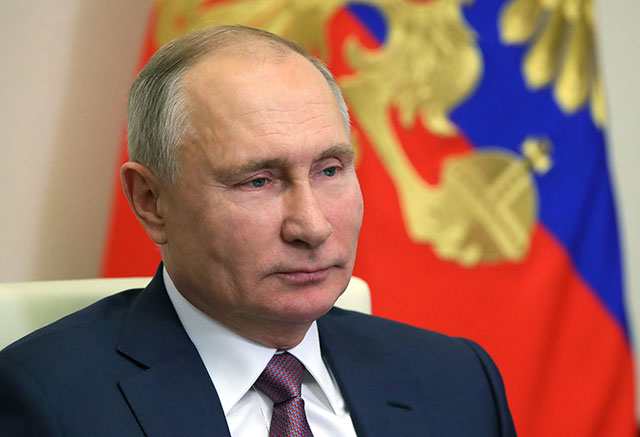 In this file photo taken on December 24, 2020 Russian President Vladimir Putin holds an end of the year meeting with members of the government via a videoconference call at the Novo-Ogaryovo state residence outside Moscow (AFP photo)
