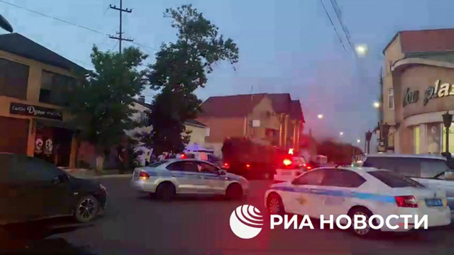 This screen grab photo taken from video released on Sunday by Russian state news agency RIA Novosti shows an area sealed off by police following deadly attacks on churches and a synagogue in Russia’s North Caucasus region of Dagestan (AFP photo)
