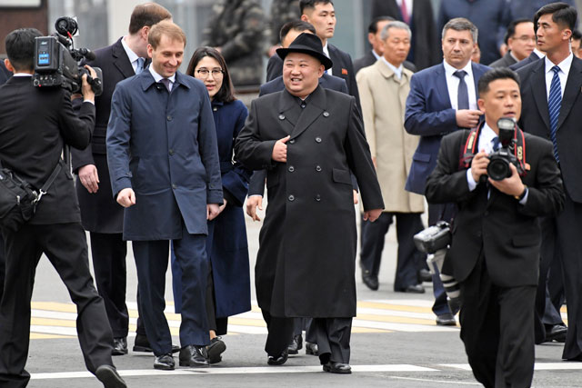 North Korean leader Kim Jong-un walks upon arrival at the railway station in the far-eastern Russian port of Vladivostok on Wednesday (AFP photo)