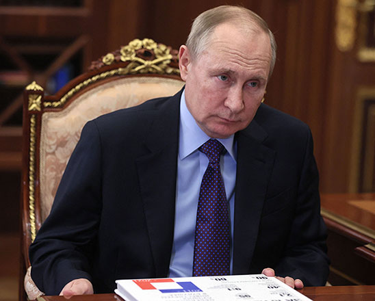 Russia's President Vladimir Putin meets with local Russian officials in the Kremlin in Moscow, on Thursday (AFP photo)