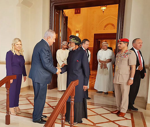 Israeli Prime Minister Benjamin Netanyahu and his wife Sara Netanyahu (left) meeting with Oman's Sultan Qaboos (centre to right) in the Omani capital Muscat during his unannounced visit to the Gulf country on Friday (AFP photo)