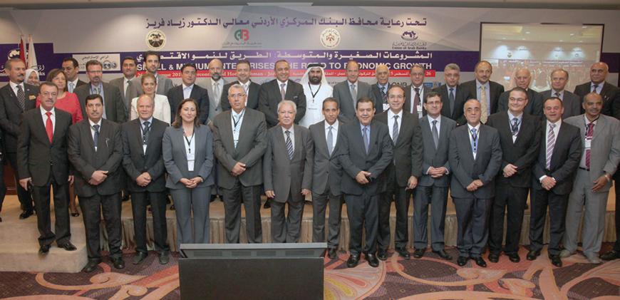 Participants in a forum, titled ‘SMEs: The Road to Economic Growth’ pose for a group photo on Wednesday in Amman (Petra photo)