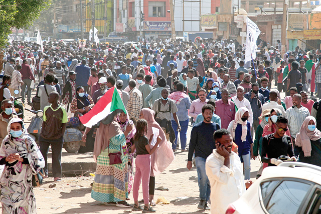 Sudanese rally to oppose a military coup which occurred nearly three months ago, south of the capital Khartoum, on Monday (AFP photo)