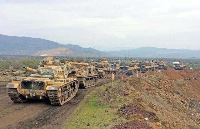 Turkish armoured vehicles move towards Hassa district of Hatay, Turkey, as part of the ‘Operation Olive Branch’ on Sunday (Anadolu Agency photo)
