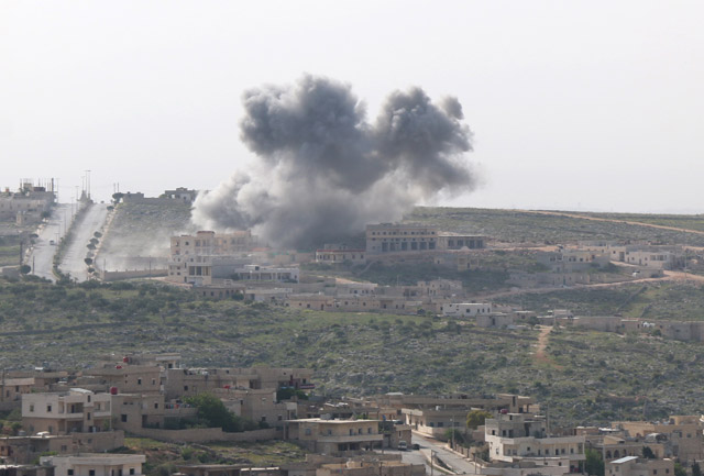 Smoke rises after aircrafts reportedly belong to government forces carried out air strikes on the Darat Izza district of Aleppo, Syria, on Saturday (Anadolu Agency photo)