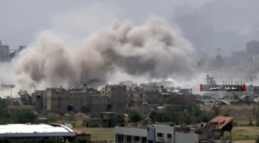 A still image taken from a video uploaded by the Syrian army on Saturday shows smoke rising from Qaboun, on the edge of the capital Damascus, Syria (Reuters photo)