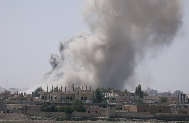 Smoke rises from Al Mishlab district at Raqqa’s southeastern outskirts, Syria, June 7 (Reuters photo)