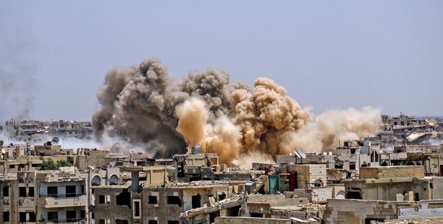 A huge explosion sends clouds into the air after government forces reportedly carried out air and ground strikes over the rebel-held Ein Tarma district in the Eastern Ghouta region of Damascus, Syria, on Monday (Anadolu Agency photo)