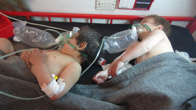  Children get treatment at a hospital after a reported chlorine gas attack on Khan Sheikhun town of Idlib, Syria, on Tuesday (Anadolu Agency photo)