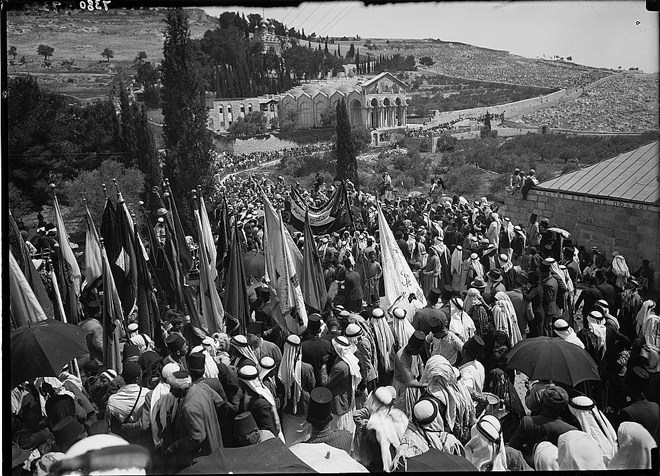 Pilgrims are passing by Gethsemane garden under the Mount of Olives in Jerusalem in 1936 (Photo courtesy of the Library of Congress)