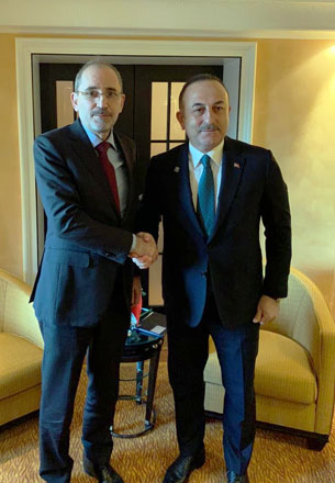  Foreign Minister Ayman Safadi meets with his Turkish counterpart Mevlut Cavusoglu on the sidelines of the Munich Security Conference (Photo courtesy of Foreign Ministry)