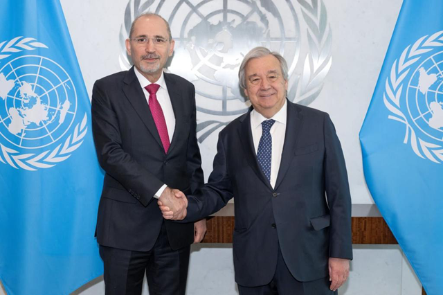Deputy Prime Minister and Foreign Minister Ayman Safadi and United Nations Secretary-General António Guterres pose for a photo in New York on Wednesday (Photo courtesy of Foreign Ministry)