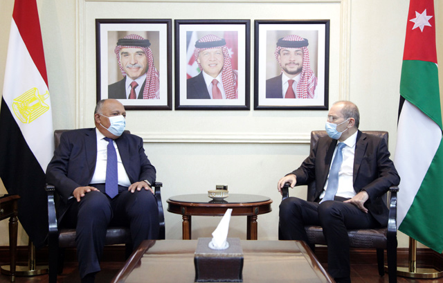Deputy Prime Minister and Foreign Minister Ayman Safadi meets with Egyptian Foreign Minister Sameh Shoukry on Monday (Photo courtesy of Foreign Ministry)