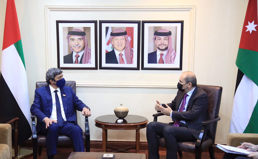 Deputy Prime Minister and Foreign Minister Ayman Safadi (right) talks with UAE Foreign Minister Sheikh Abdullah Bin Zayed Al Nahyan (left) on Wednesday in Amman (Petra photo)