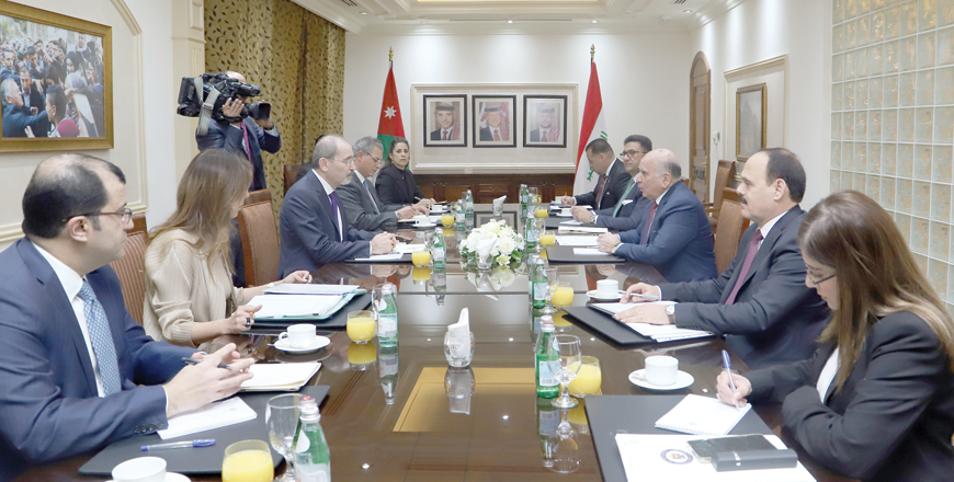 Deputy Prime Minister and Foreign Affairs Minister Ayman Safadi meets with Iraqi Deputy Prime Minister and Foreign Minister Fuad Hussein in Amman on Tuesday (Petra photo)