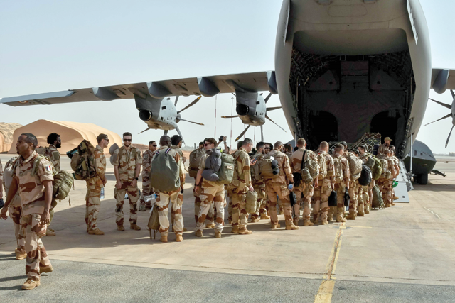 The last French soldiers board a French military plane to leave Niger for good, at the French base which was handed over to the Nigerien army, in Niamey (AFP photo)