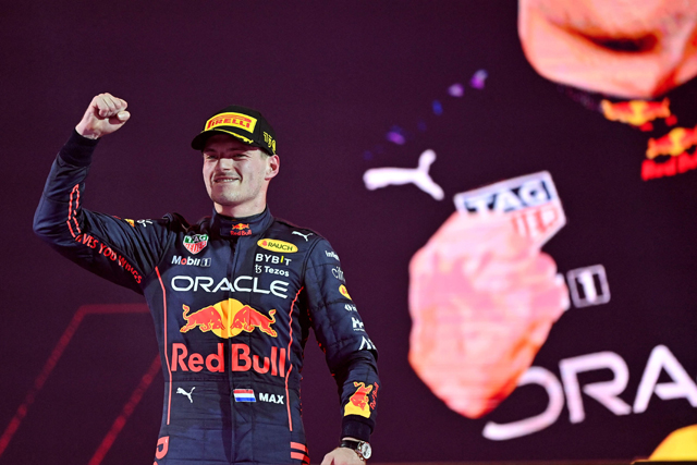 Red Bull’s Dutch driver Max Verstappen celebrates on the podium after the 2022 Saudi Arabia Formula One Grand Prix at the Jeddah Corniche Circuit on Sunday  (AFP photo by Andrej Isakovic)