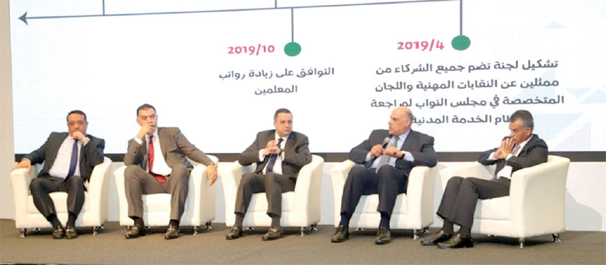 The government announces salary hikes for public servants, military personnel and civil and military retirees during a panel discussion held at the Royal Cultural Centre in Amman on Thursday (Petra photo)