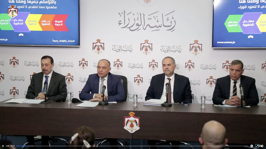 Minister of State for Media Affairs Amjad Adaileh (2nd left) speaks during a joint press conference at the Prime Ministry on Sunday attended by Minister of Education Tayseer Nueimi (1st left), Health Minister Saad Jaber (1st right) and Justice Minister Bassam Talhouni in this image grab taken from a video posted on the Prime Ministry’s Facebook page (Photo courtesy of Prime Ministry Facebook page)