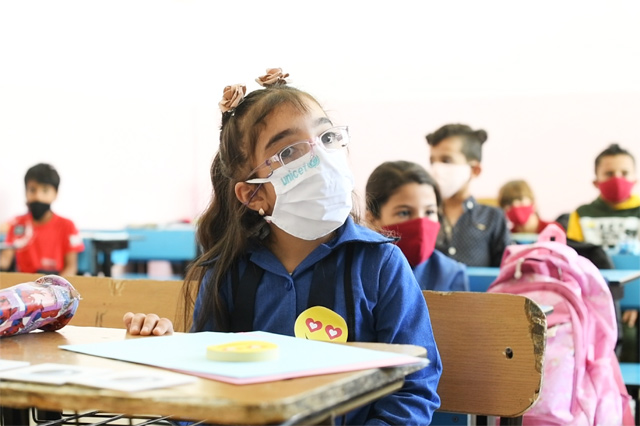 Seleen Fadi Al Mathloom, an eight-year-old girl with cerebral palsy, attends class at Khawla Bint Al Azwar School in Sahab in this recent photo (Photo courtesy of UNICEF)