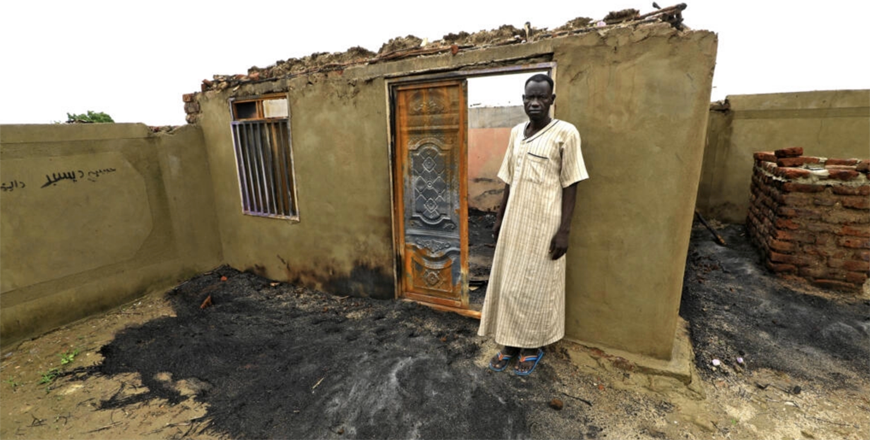 Sudan’s Blue Nile state has seen repeated deadly unrest since July: This August 8 photograph shows home that was set on fire near Roseires  (AFP photo)