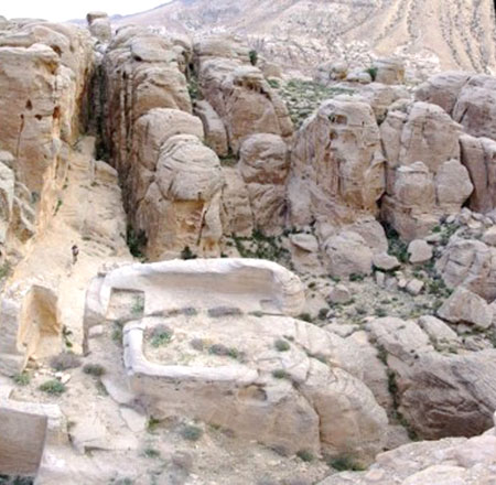 A gate area and natural rock tower that forms the entrance to the former mountain top fortress of Sela (Photo courtesy of biblicalarchaeology.org)