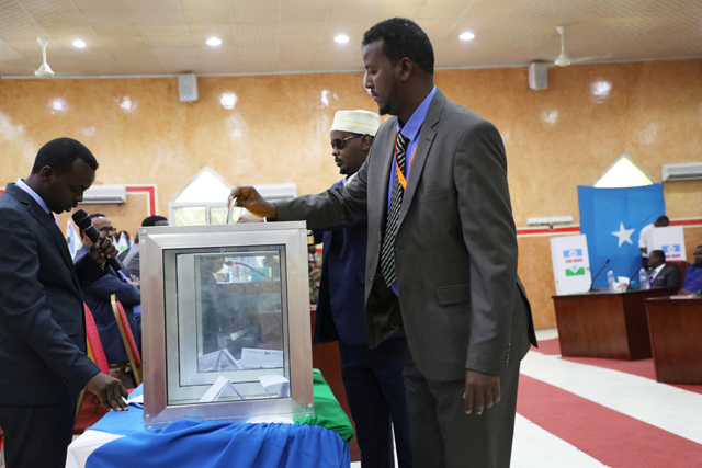 A member of parliament for the semi-autonomous region of Puntland casts his vote in the Puntland’s presidential election in Garowe, Puntland state, northeastern Somalia, on Tuesday (Reuters photo)