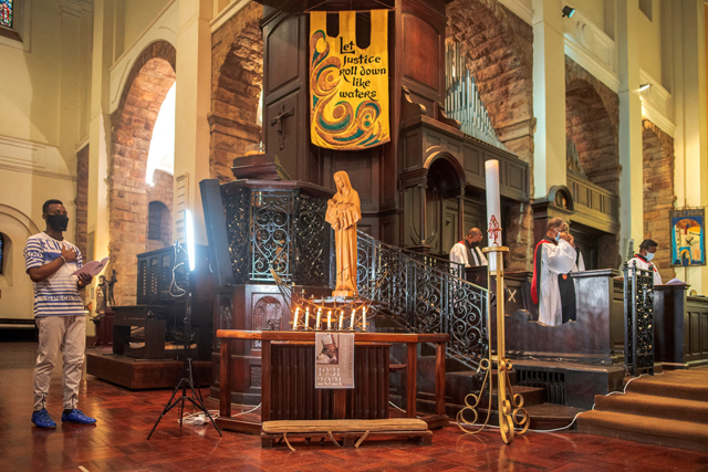 Anglican reverends are seen at a memorial mass in honour of South African anti-apartheid icon Archbishop Desmond Tutu at the St Mary Cathedral in the Johannesburg CBD on Tuesday (AFP photo)
