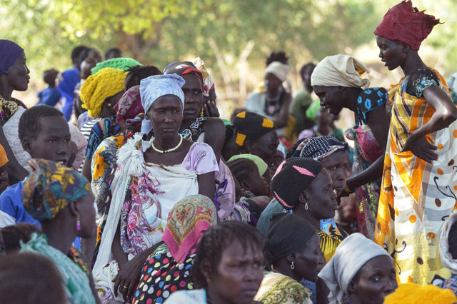 A group of South Sudanese returnees gather at the County Commissioners office in Udier town, South Sudan, on March 9  (Reuters photo)