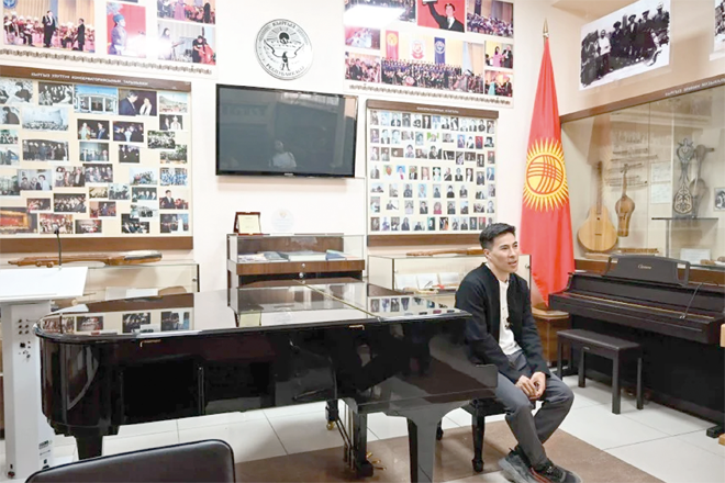 Renowned composer and head of the department of musicology and composition at the Kyrgyz National Conservatory, Balasaguyn Musayev, who participates in a competition to create a new national anthem for Kyrgyzstan, attends an AFP interview in Bishkek on April 4 (AFP photo)