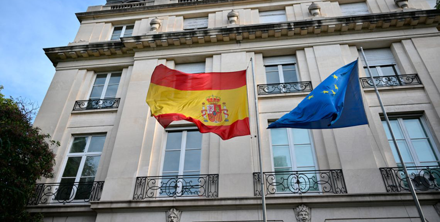 Spanish and European Union flags fly at the Spanish embassy in Buenos Aires on Monday (AFP photo)