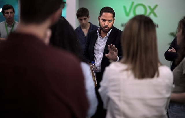 Spanish far-right Vox Party Secretary-General Ignacio Garriga chats with journalists after a press conference at the party's headquarters in Madrid, on Monday (AFP photo)