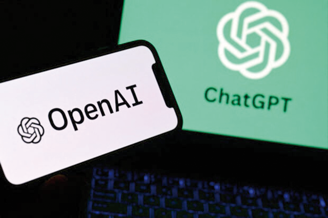 A photo taken on October 4in Manta, near Turin, shows a smartphone and a laptop displaying the logos of the artificial intelligence OpenAI research laboratory and ChatGPT robot (AFP photo)
