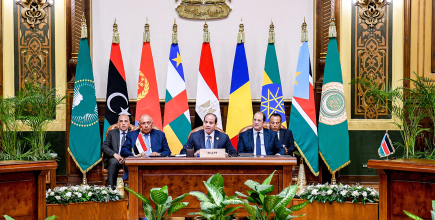This handout photo released by the Egyptian Presidency shows Egyptian President Abdel Fattah Al Sisi, accompanied by Foreign Minister Sameh Shoukry and intelligence chief Abbas Kamel  attending a regional summit for neighbouring nations impacted by the three-month war between Sudan's rival generals in Cairo on Thursday (AFP photo)