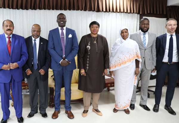Prosecutor of the International Criminal Court, Fatou Bensouda (centre), poses with Sudanese officials during her visit to the ministry of justice in Khartoum on Sunday (AFP photo)