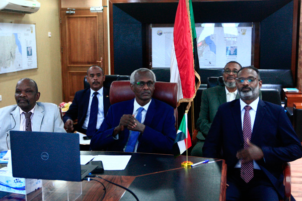 Sudan’s Minister of Irrigation and Water Resources Yasser Abbas (centre) participates in a videoconference with his Egyptian and Ethiopian counterparts (unseen) in the Sudanese capital Khartoum, on Sunday (AFP photo)