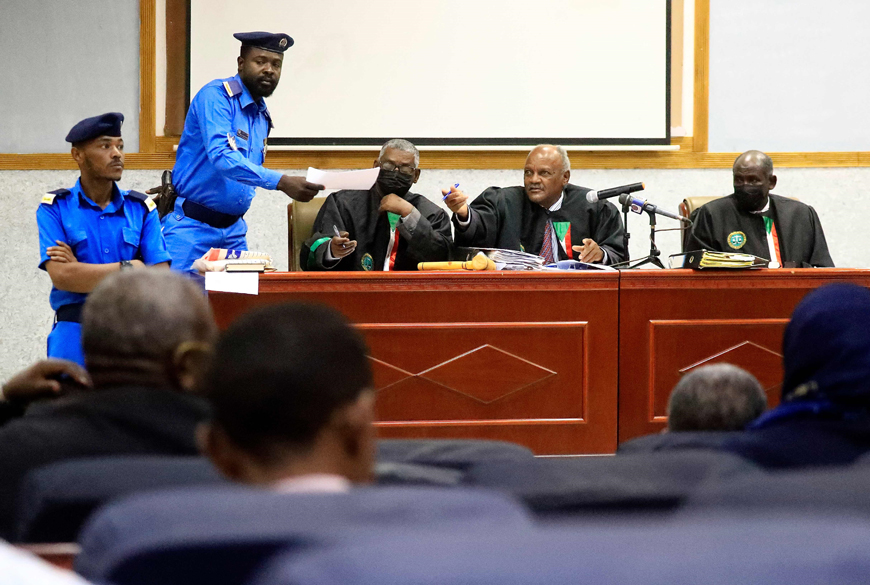 A photo taken on Wednesday shows the trial of Sudan’s ousted president Omar Al Bashir (unseen) along with others over the 1989 military coup that brought them to power, at a courthouse in the capital Khartoum (AFP photo)