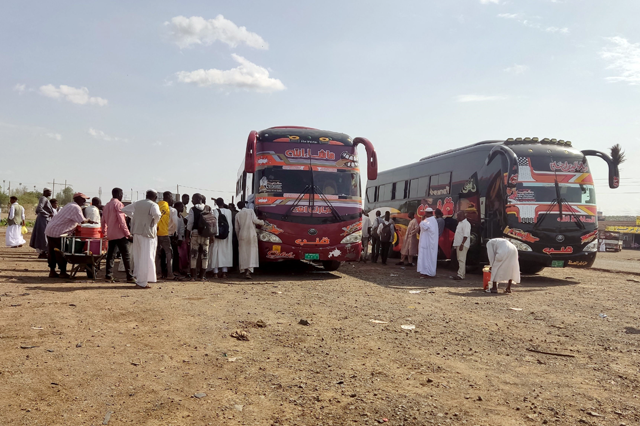 Sudanese fleeing violence gather in Gadaref, the capital of Sudan's eastern state of Gadaref, on Monday (AFP photo)