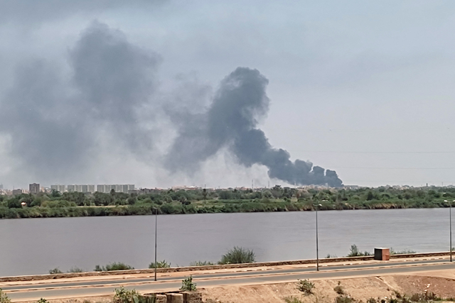 A photo taken from Omdurman shows smoke billowing in the distance in Khartoum North amid ongoing fighting in war-torn Sudan on Tuesday (AFP photo)