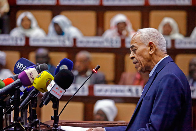   Sudan’s Justice Minister Mohamed Ahmed Salim addresses the Parliament in Khartoum as lawmakers discussed on Wednesday the measure imposed by the president to quell  anti-government protests (AFP photo)