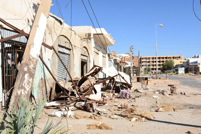 A photo taken on Sunday shows a general view of damaged shops and houses in Sudan's Al Jazira state capital Wad Madani following its takeover by the army from paramilitary Rapid Support Forces  (AFP photo)